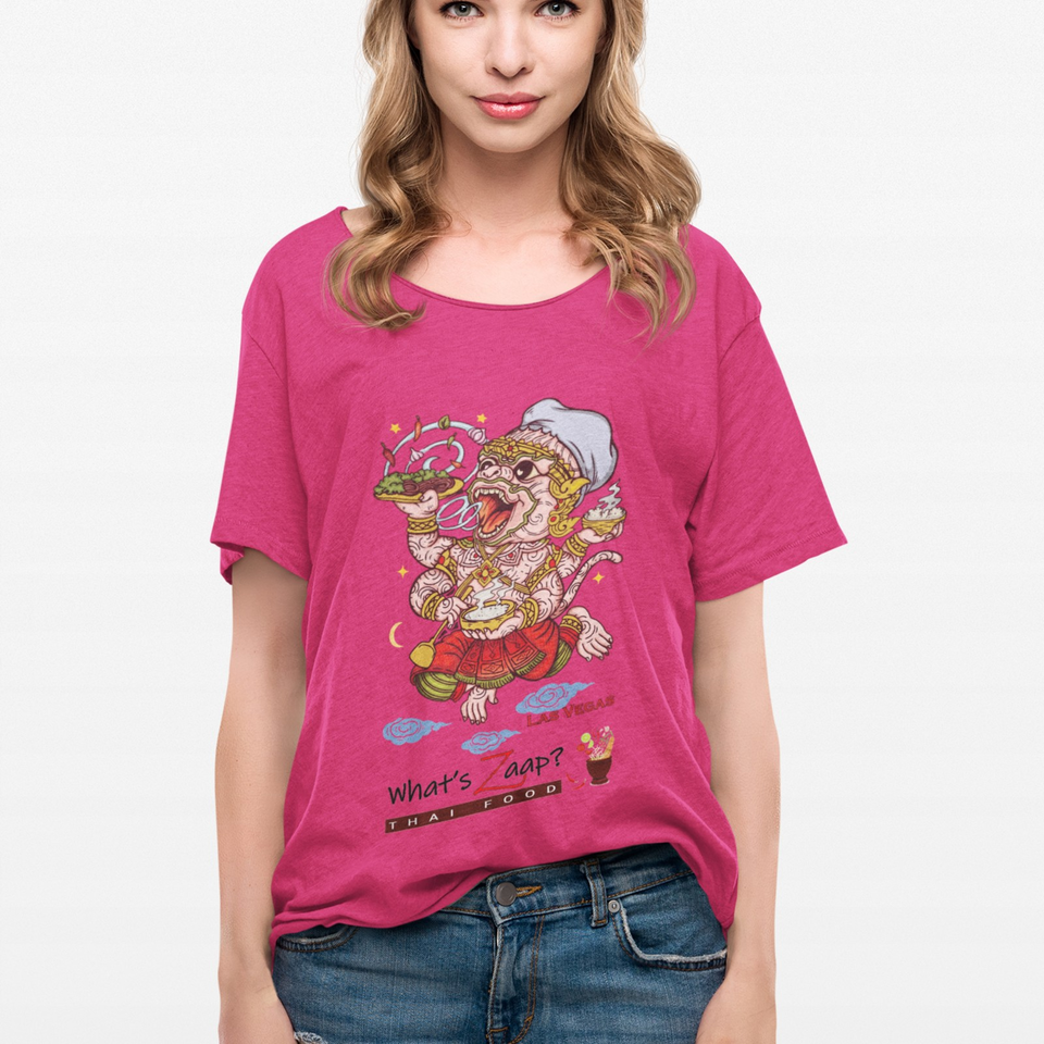 Woman wearing a bright pink T-shirt featuring a colorful Thai food character and the text “What’s Zaap? Thai Food.”